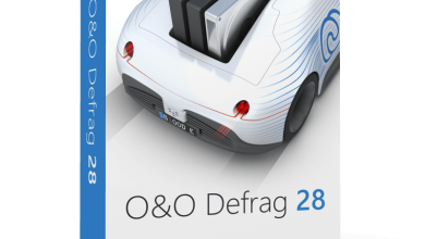 A Product Box For O&Amp;O Defrag Professional 28 Software Is Displayed. The Box Features An Illustration Of A Car With An Open Trunk Carrying Computer Hard Drives. The Box Is Primarily White With Blue Accents, And The Text &Quot;O&Amp;O Defrag Professional 28&Quot; Is Prominently Shown On The Front.