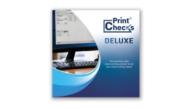 A Product Box For Print Checks Deluxe Software. The Design Features A Computer Screen And Checks Being Printed, With Branding And Text That Reads, &Quot;The Business Class Check Printing Solution For All Your Check Printing Needs.&Quot; The Color Scheme Is Primarily Blue And White, Highlighting The Pre-Activated Software.