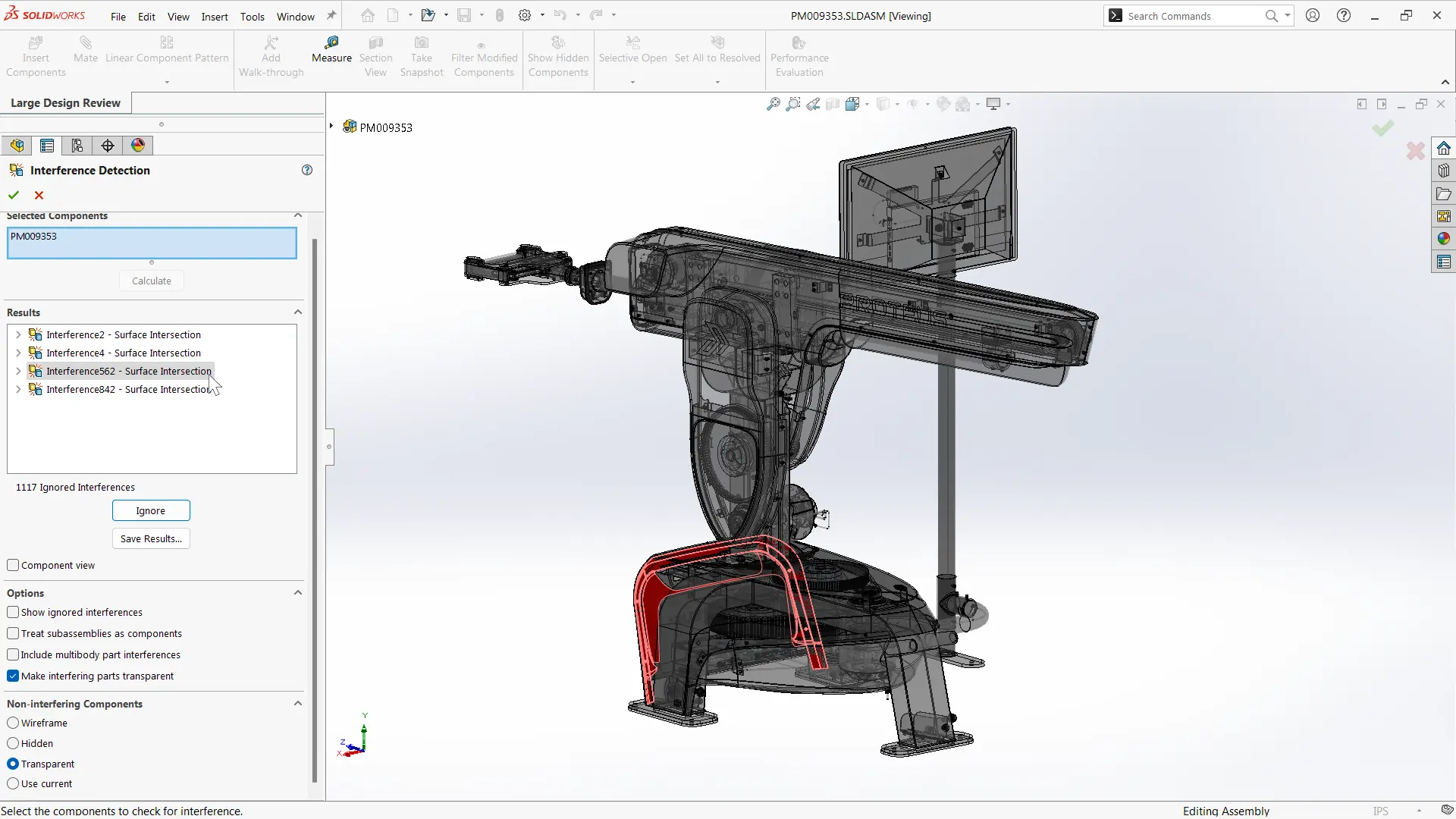 A digital rendering of a robotic arm in SolidWorks Premium 2025 shows its internal components. The interface displays interference detection with red-highlighted sections, a feature tree on the left, and various toolbars and controls at the top.